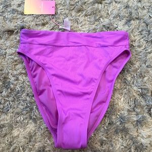 Brand new bikini bottoms, never worn size medium light, purple color